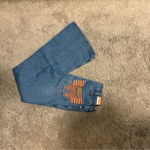 Blue Jeans with Orange WhatABurger logo